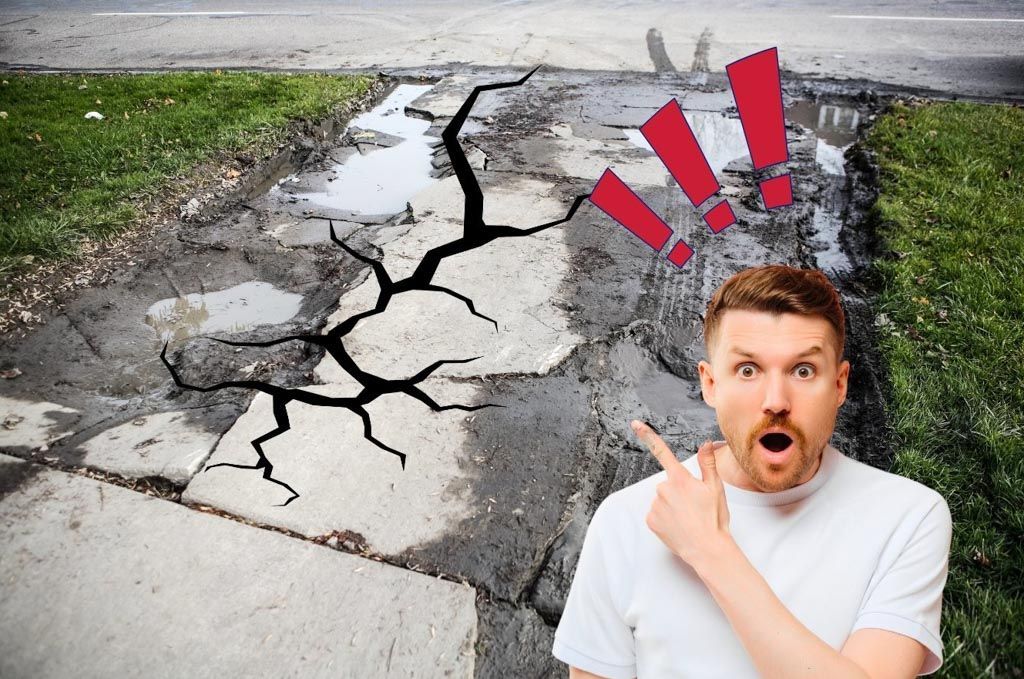 Cracked concrete driveway surface